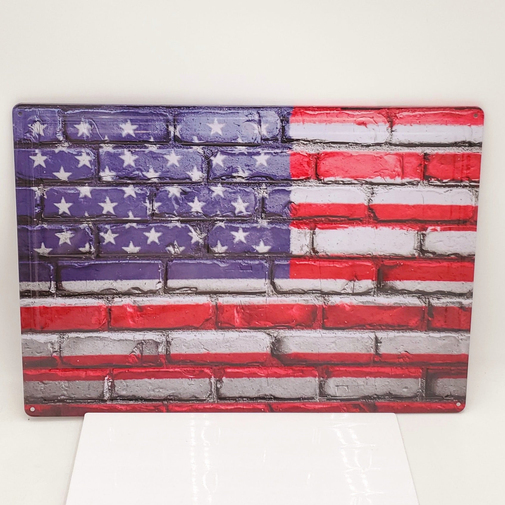 SIGN-TIN, USA FLAG PAINTED ON BRICK