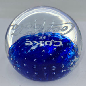 Coke is Coca-Cola glass advertising paperweight.  (100 Tickets Available)